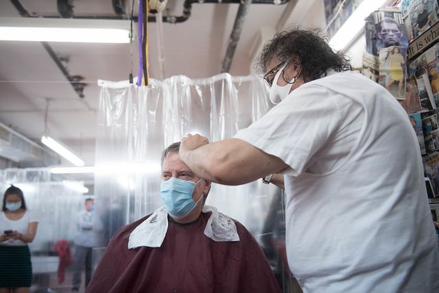Mayor Bill de Blasio celebrates the launch of Phase 2 reopening by visiting Astor Place Hairstylists for a haircut on Tuesday June 23, 2020.
